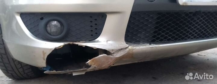 Бампер Mitsubishi Lancer 10