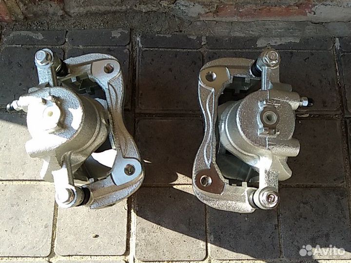 Суппорт тормозной Hyundai Solaris 2 581901RA00