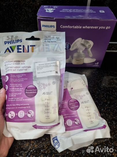 Молокоотсос Avent ручной + бутылочка 0+ комплект