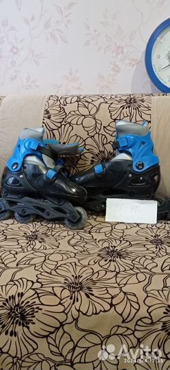 Роликовые коньки