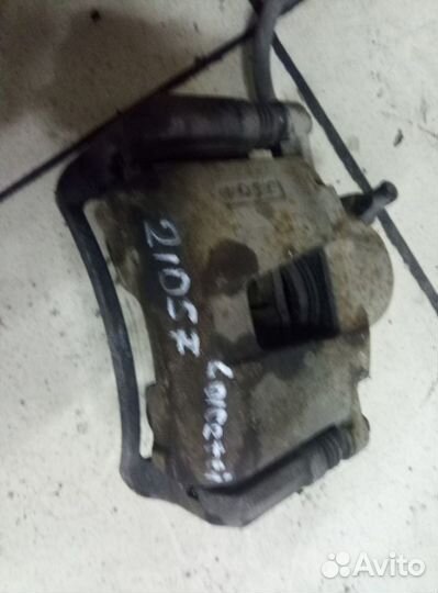 Суппорт тормозной правый Chevrolet Lacetti 2003-20