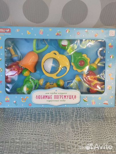 Игрушки погремушки для малышей