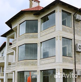 Безрамное остекление зданий