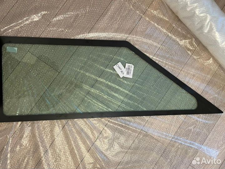 Стекло боковое левое Caterpillar