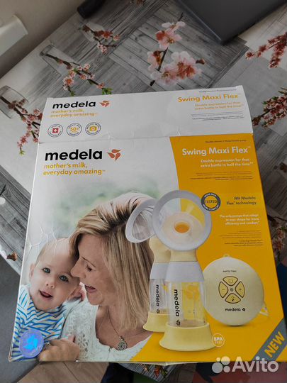 Молокоотсос medela swing maxi flex