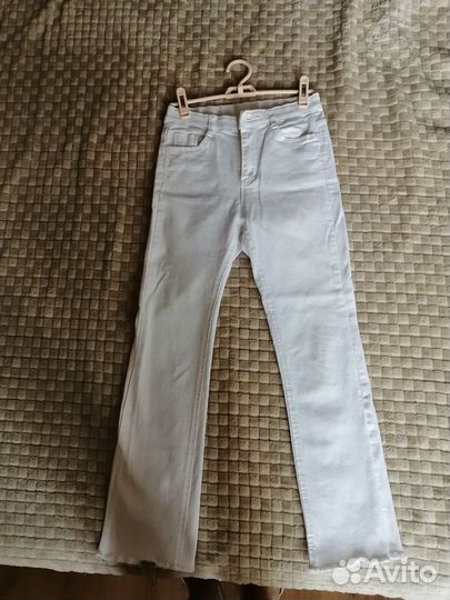 Джинсы капри