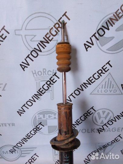 Стойка амортизатор задняя левая Chevrolet Epica