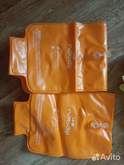 Нарукавники и жилетка для плавания