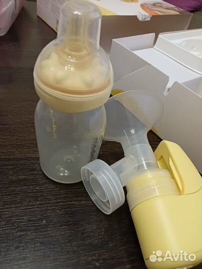 Молокоотсос medela mini electric