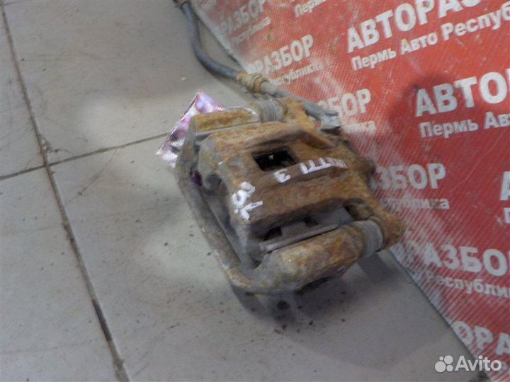 Суппорт тормозной задний левый Chevrolet Lacetti