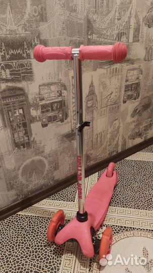Самокат розовый для девочек 3-5