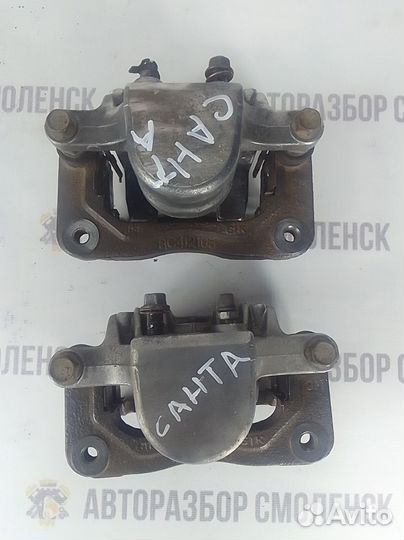 Суппорт задний левый / правый Hyundai Santa Fe