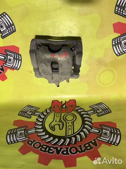 Суппорт передний правый Nissan Almera G15