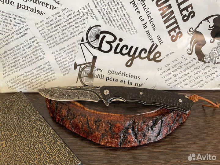 Складной нож из дамасской стали