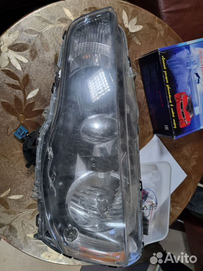 Фара левая на митсубиси lancer 10