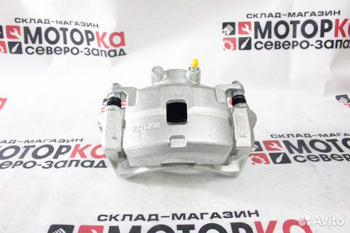 Суппорт тормозной передний правый Mitsubishi L200