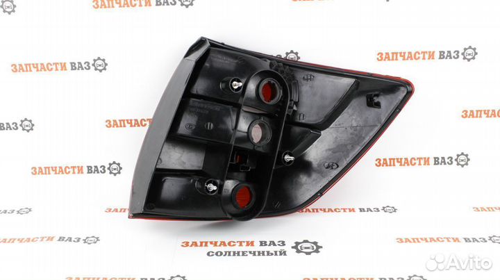 Фонарь задний Левый Гранта штатный Новый