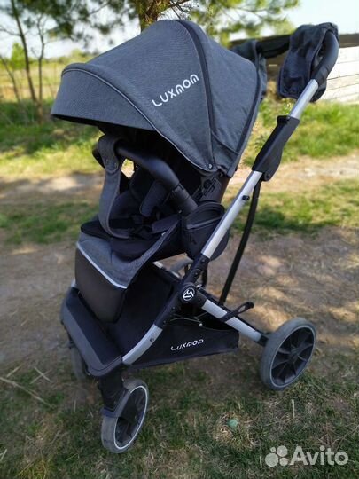 Прогулочная коляска с реверсивным блоком