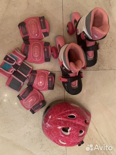 Роликовые коньки