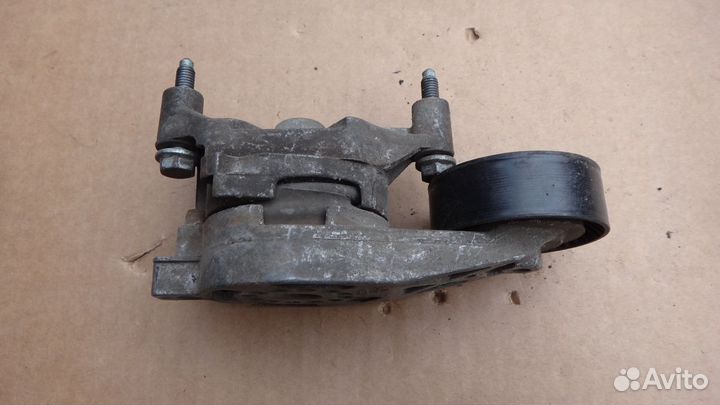 Натяжитель приводного ремня Ауди Фольксваген Шкода