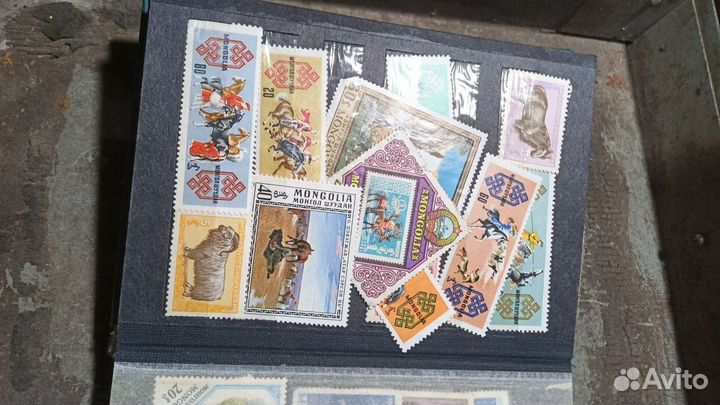 Альбом марок монголии,20 страниц