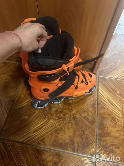 Роликовые коньки