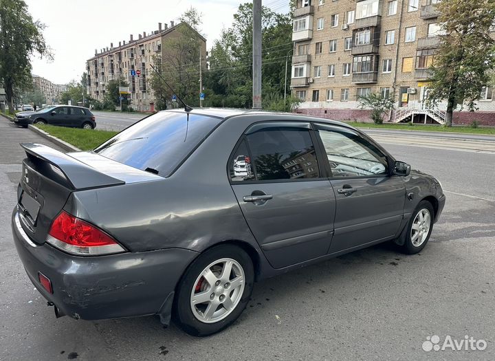 Mitsubishi Lancer 1.6 МТ, 2006, 183 000 км