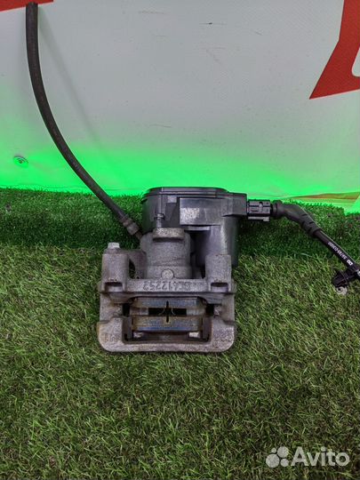 Суппорт тормозной задний левый Kia Sportage QL