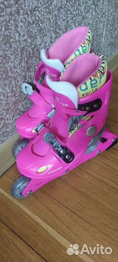 Роликовые коньки