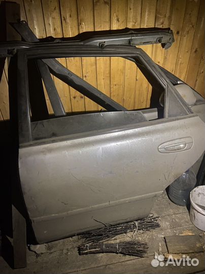 Дверь задняя левая mazda 626 GE (1992-1997)