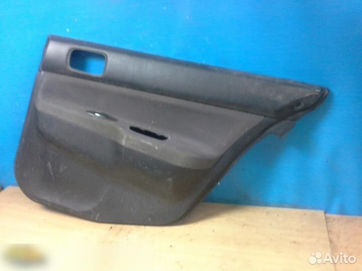 Обшивка двери задней правой Mitsubishi Lancer (CS