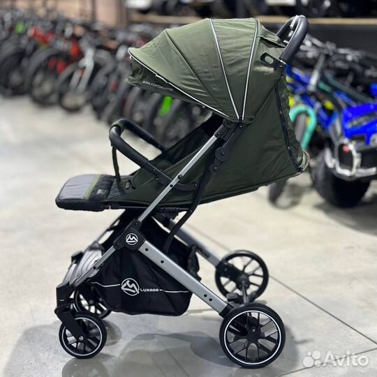 Прогулочная коляска новая