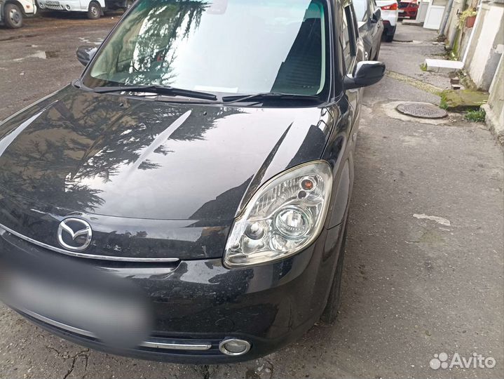 Фара mazda verisa