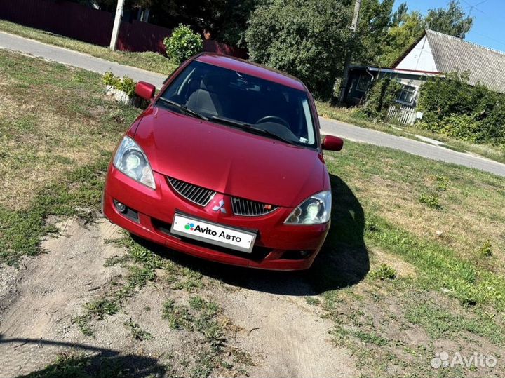 Mitsubishi Lancer 1.6 МТ, 2004, 263 000 км