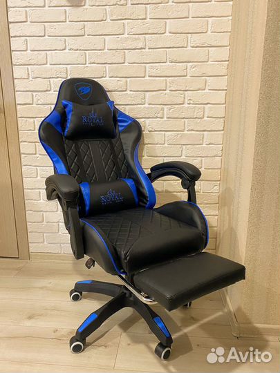 Компьютерное кресло с подножкой и вибромассажем