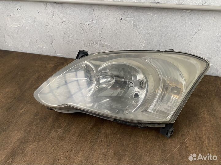 Фара левая Toyota Corolla 120