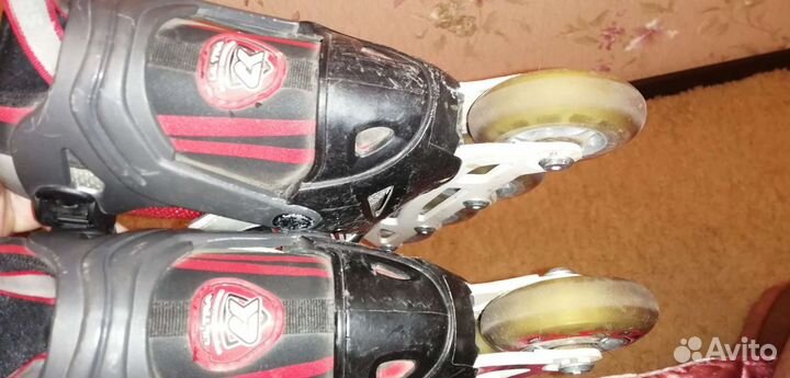 Роликовые коньки