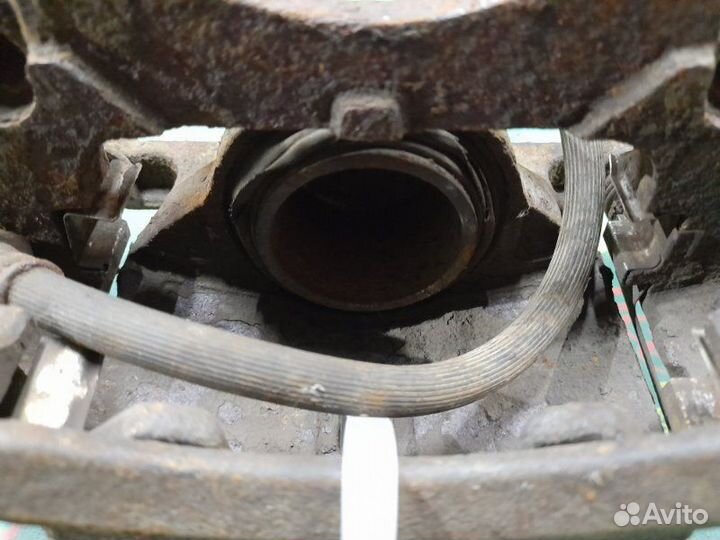 Суппорт передний левый Nissan Qashqai