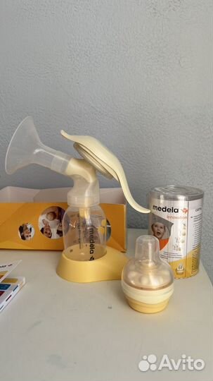 Молокоотсос medela ручной