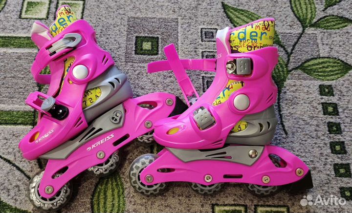 Роликовые коньки