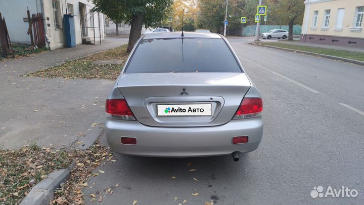 Mitsubishi Lancer 1.6 МТ, 2005, 307 220 км