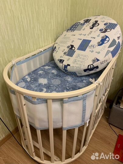 Детская кроватка с поперечным маятником