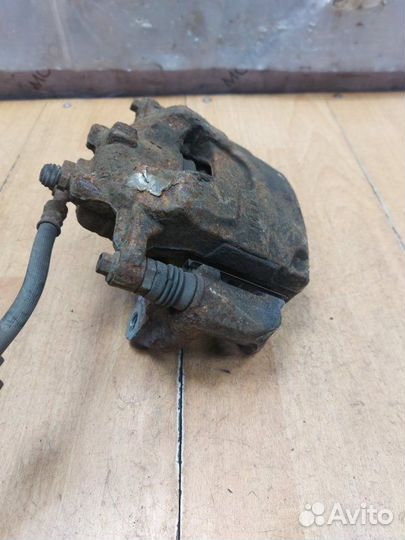 Тормозной суппорт передний правый Opel Astra J