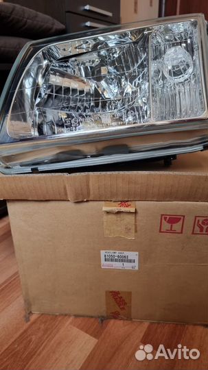 Фара левая на Toyota Land Cruiser 100