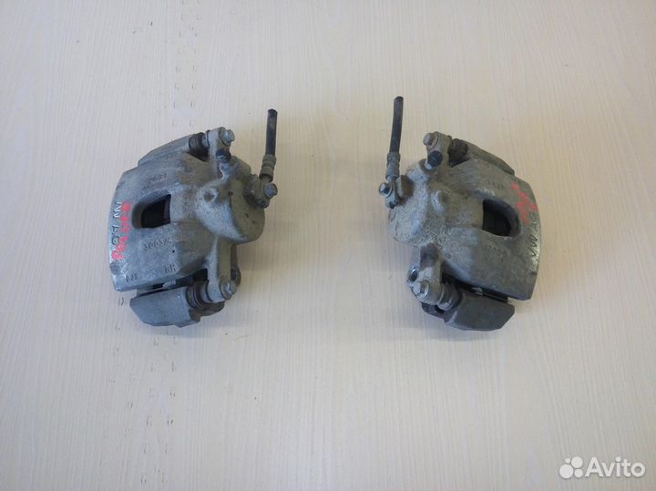 Суппорт тормозной передний Volkswagen Polo седан