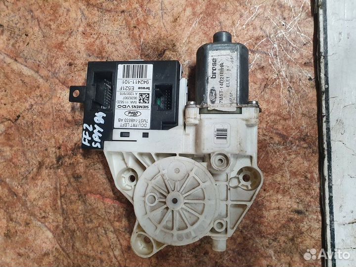 Моторчик стеклоподьемника задний левый Ford Focus