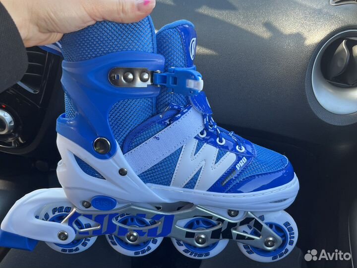 Роликовые коньки