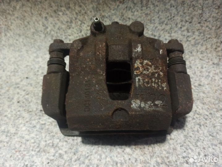 Суппорт передний правый Kia Rio 3