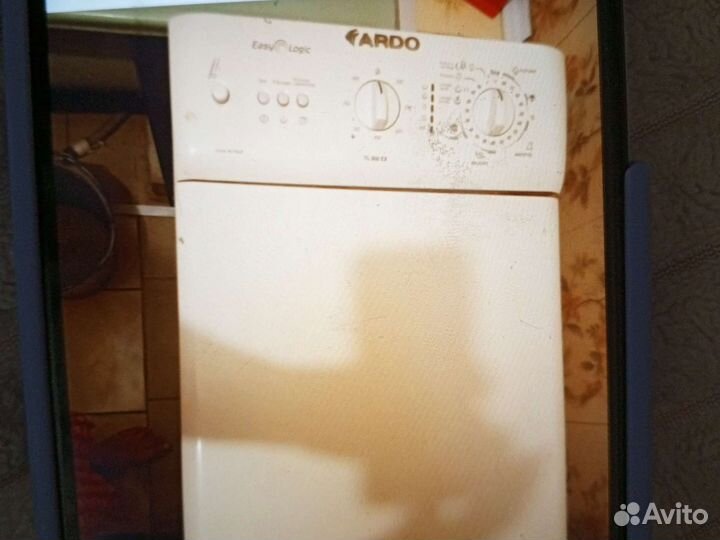 Стиральная машина с вертикальной загрузкой