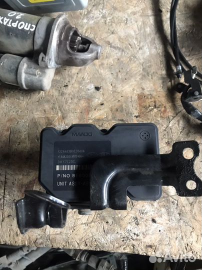 Блок ABS Kia Sportage 3 SL